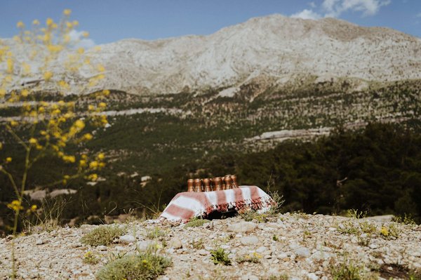 A-tray-of-Turkish-coffee-cups-in-front-of-the-dramatic-Taurus-Mountains-visited-by-Slow-Cyclists