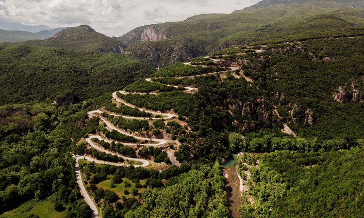 Hairpin-bends-on-a-mountain-in-Zagori-where-Slow-Cyclists-ride