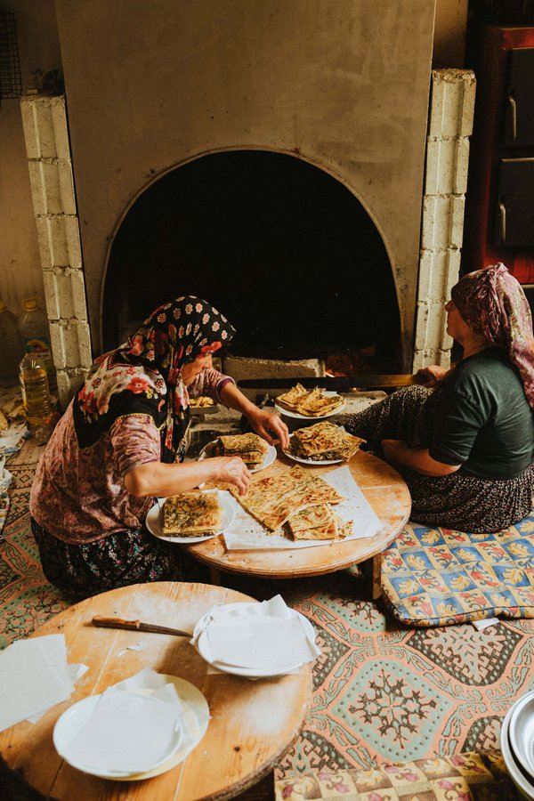 Local-women-cooking-Turkish-gozleme-for-Slow-Cyclists-in-Taurus-Mountains