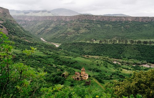 Monastery-against-backdrop-of-mountains-and-valleys-in-Armenia-Slow-Cyclist