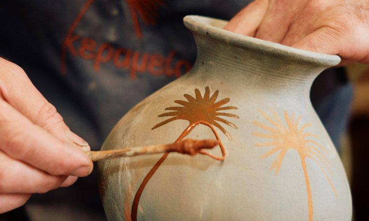 Pottery-painting-on-a-Slow-Cyclist-journey-in-Crete-Greece-landscape