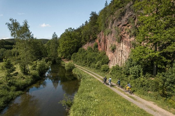 Slow-Cyclists-riding-through-a-gorge-in-Lower-Silesia-Poland